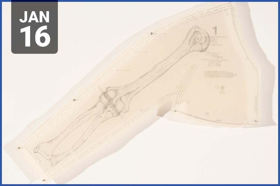 Image of bone drawing on sewing pattern paper.